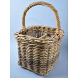 A Vintage Wicker Four Bottle Carrying Basket, 24cms Square