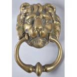 A Brass Lion Mask Door Knocker, 17cms High