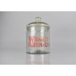 An Early 20th Century Advertising Glass Jar and Domed Cover For "Wright and Sons Ltd", 27cm high