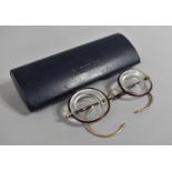 A Pair of Yellow Metal and Tortoise Spectacles in Faberge Case