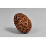 A Late 19th Century Carved and Pierced Ovoid Thimble Case Containing Thimble, 4.75cms High