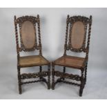 A Pair of Victorian Carved Gothic Revival Caned Seated and Back Hall Chairs with Barley Twist