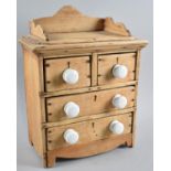 A Late 19th/Early 20th Century Galleried Pine Kitchen Spice Chest with White Ceramic Knobs, Two
