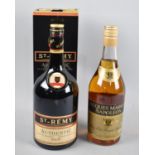 A Bottle of St Remy VSOP French Brandy in Cardboard Container together with a Single Bottle of