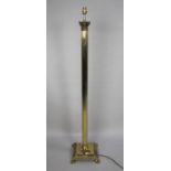 A Mid 20th Century Brass Standard Lamp in the Form of a Reeded Corinthian Column on Stepped Square