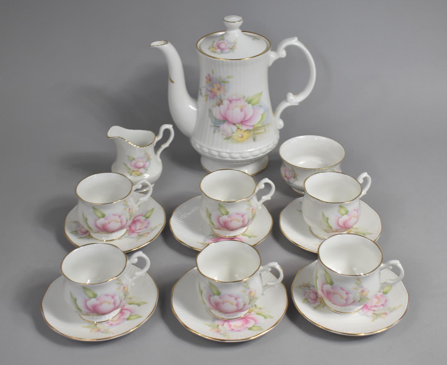 A Pall Mall Floral Decorated Tea Set to Comprise Teapot, Six Cups, Six Saucers, Milk Jug and a Sugar