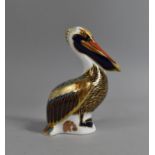 A Royal Crown Derby Paperweight, Brown Pelican, Silver Button