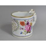 An Early 19th Century Staffordshire Tankard with Greyhound Handle Decorated with Floral Spray and
