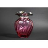 A Silver Overlay Rimmed Cranberry Glass Vase of Wrythen Form, 16cm high