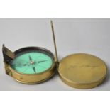 A Circular Brass Prismatic Compass, Lid Inscribed John S Bridges, Printed Green Inner Card for Baker