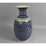 A Large Modern Vase decorated in Multicoloured Enamels on Blue Ground, 48cms High
