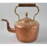 A Large Brass and Copper Kettle with Acorn Finial