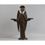A Modern Cast Resin Bronze Effect Double Candle Pricket in the Form of an Angel, 52cms High