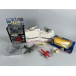 A Collection of Boxed and Loose Diecast Models of Warplanes and Commercial Aircraft