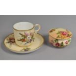 A Royal Blush Ivory Lidded Pot Together with a Cup and Saucer