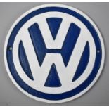 A Circular Cast Iron Reproduction Wall Plaque for Volkswagen, 23cms Diameter