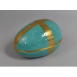 A Coalport Box of Egg Form Decorated with Gilt Cross on Powder Blue Ground, 13cm long