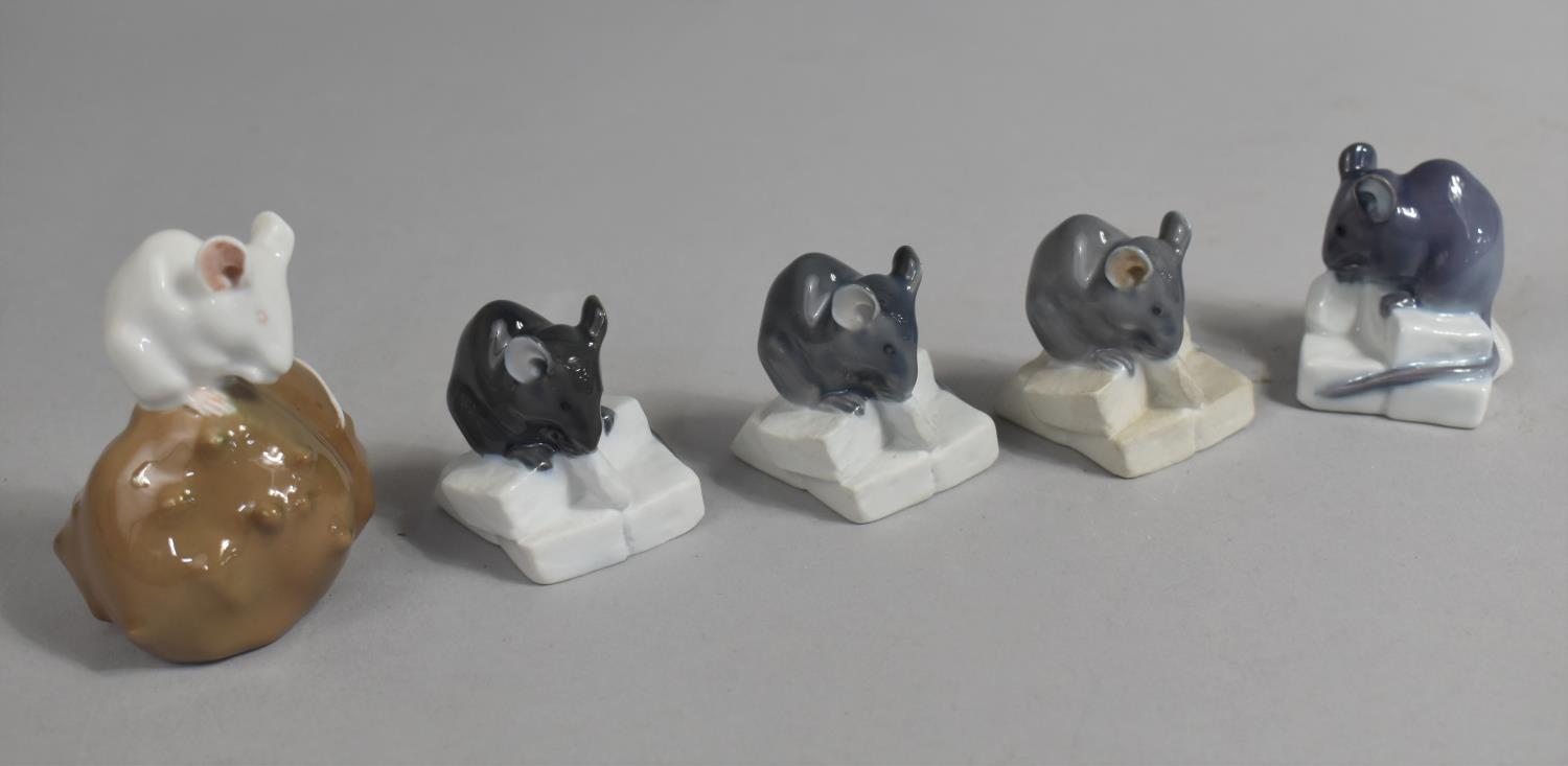 A Set of Four Royal Copenhagen Mice Ornaments Together with a White Mouse on a Walnut Example