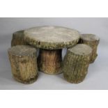 A Faux Bois Garden Table and Stool Set to Comprise Circular Table and Four Trunk Effect Stools