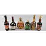 A Collection of Various Whiskies and Brandies to Include Dimple