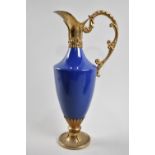 A Mid 20th century Gilt and Blue Glazed Ceramic Claret Jug, Base Stamped Stock, No Stopper, 30cms