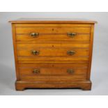An Edwardian Satin Walnut Bedroom Chest of Three Graduated Long Drawers, 92cm wide