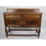 An Edwardian Oak Galleried Sideboard with two Drawers over Cupboard Base, 121cms Wide