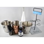Three Modern Ice Buckets Containing Prosecco and White Wine Together with a Gordons Gin Stand