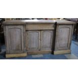 A Limed Oak Reverse Break Fronted Sideboard with Centre Drawer Over Cupboard Flanked by Cellarette