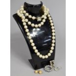 A Collection of Costume Jewellery to Include Pearl Necklace, Whitestone Earrings, Brooches etc