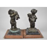 A Pair of 19th Century French Bronze Clock Garnitures in the Form of Cherubs with Sheaves of Corn