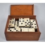 A Late 19th Century Cased Set of Small Bone Six Spot Dominoes, 11.5cms Wide