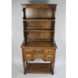 A Mid 20th Century Oak Small Dresser having Three Short Drawers over Two Small Deeper Drawers, Plate