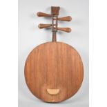 A Vintage Four String Musical Instrument in the Manner of a Japanese Ruan