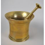 A Large Heavy Bronze Pestle and Mortar, 19th Century, 15cms Diameter and 12cms High