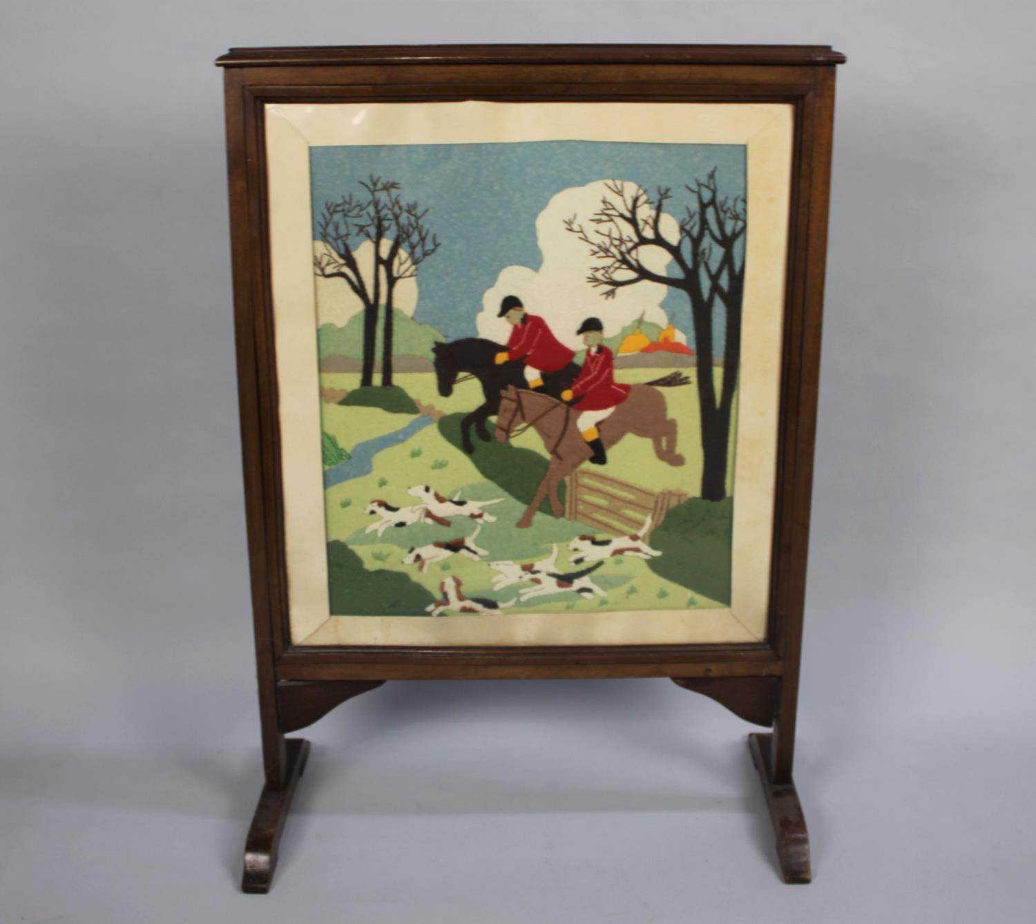 A Mahogany Framed Fire Screen Decorated with Stitched Felt Hunting Scene, 56cms Wide