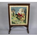 A Mahogany Framed Fire Screen Decorated with Stitched Felt Hunting Scene, 56cms Wide