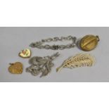 A Collection of Vintage Costume Jewellery to Include Brooches, Lockets, Bracelet etc