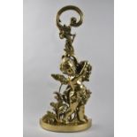 A 19th Century Polished Brass Door Porter in the Form of a Cherub with Grapes, Weighted Base,
