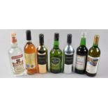 A Collection of Various White Wines and Spirits