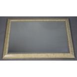 A Modern Cushion Framed Wall Mirror, 84x59cm