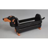 A Modern Wooden Novelty Newspaper Store or Planter in the Form of a Dachsund, 69cms Wide