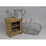 A Reproduction Wooden Egg Safe, Wire Basket and Galvanised Toy Watering Can