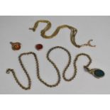 A Collection of Various Necklace Chains, Watch Chain and Fob, Amber Triangular Fob, Bloodstone Fob