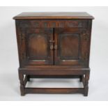 A Mid 20th Century Oak Side Cabinet, Panelled Doors to Shelved Three Division Interior, 51cms Wide