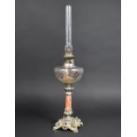 An Art Nouveau Oil Lamp with Silver Plated Base, Faux Marble Support and Floral Decorated Glass