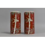 A Pair of Japanese Spill/Sleeve Vases Decorated with Bird and Bamboo on Red Enamel Ground, 12.5cm