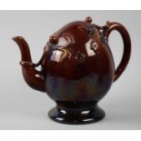 An English Rockingham Treacle Glazed Cadogan Puzzle Teapot of Usual Form