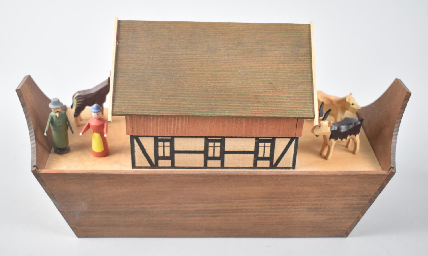 A Modern Carved Wooden Noah's Ark Toy with Figures and Animals, 25cms Wide