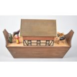 A Modern Carved Wooden Noah's Ark Toy with Figures and Animals, 25cms Wide